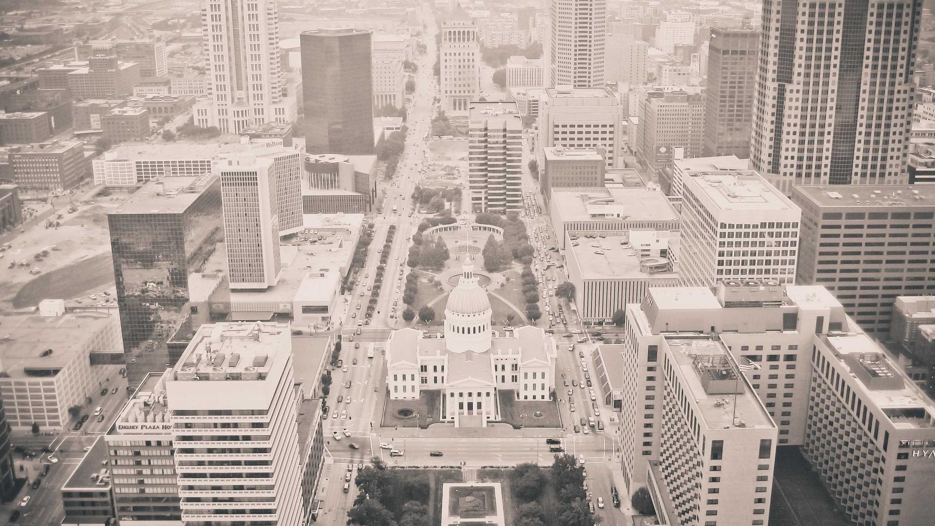 Editorial context photo looking across a dense downtown business district